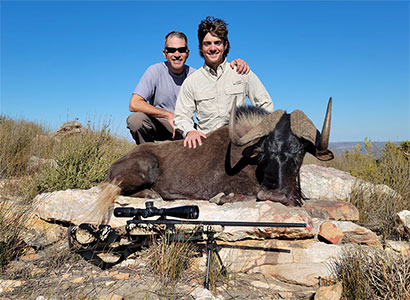 Gerardo and Hunter with their black wildebeest.